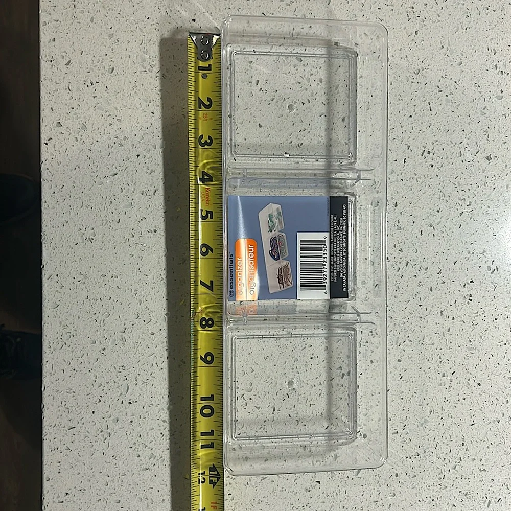 3 plastic organizers by Essentials. All three are identical. Made in China.